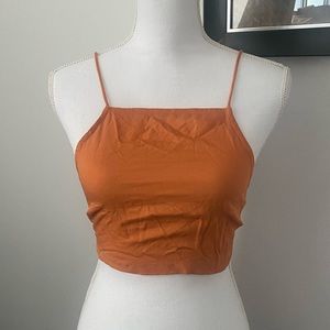 Orange open back top